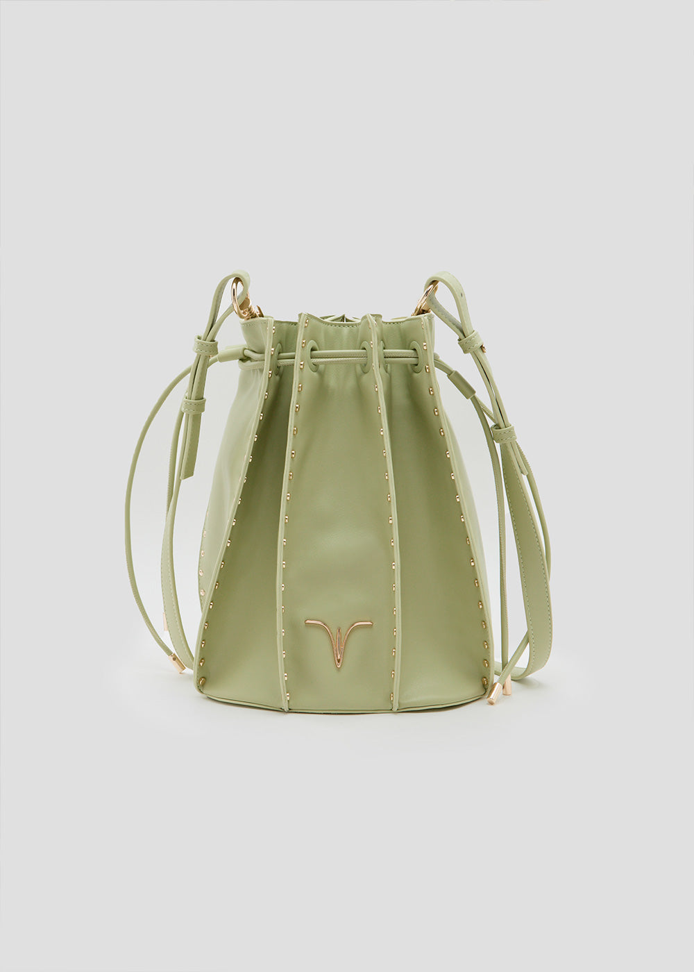 Bolso bombonera de piel vegana de máxima calidad modelo CAROLA verde. Asa regulable, tachuelas doradas. Interior con forro de CRVSH personalizado y bolsillo. 