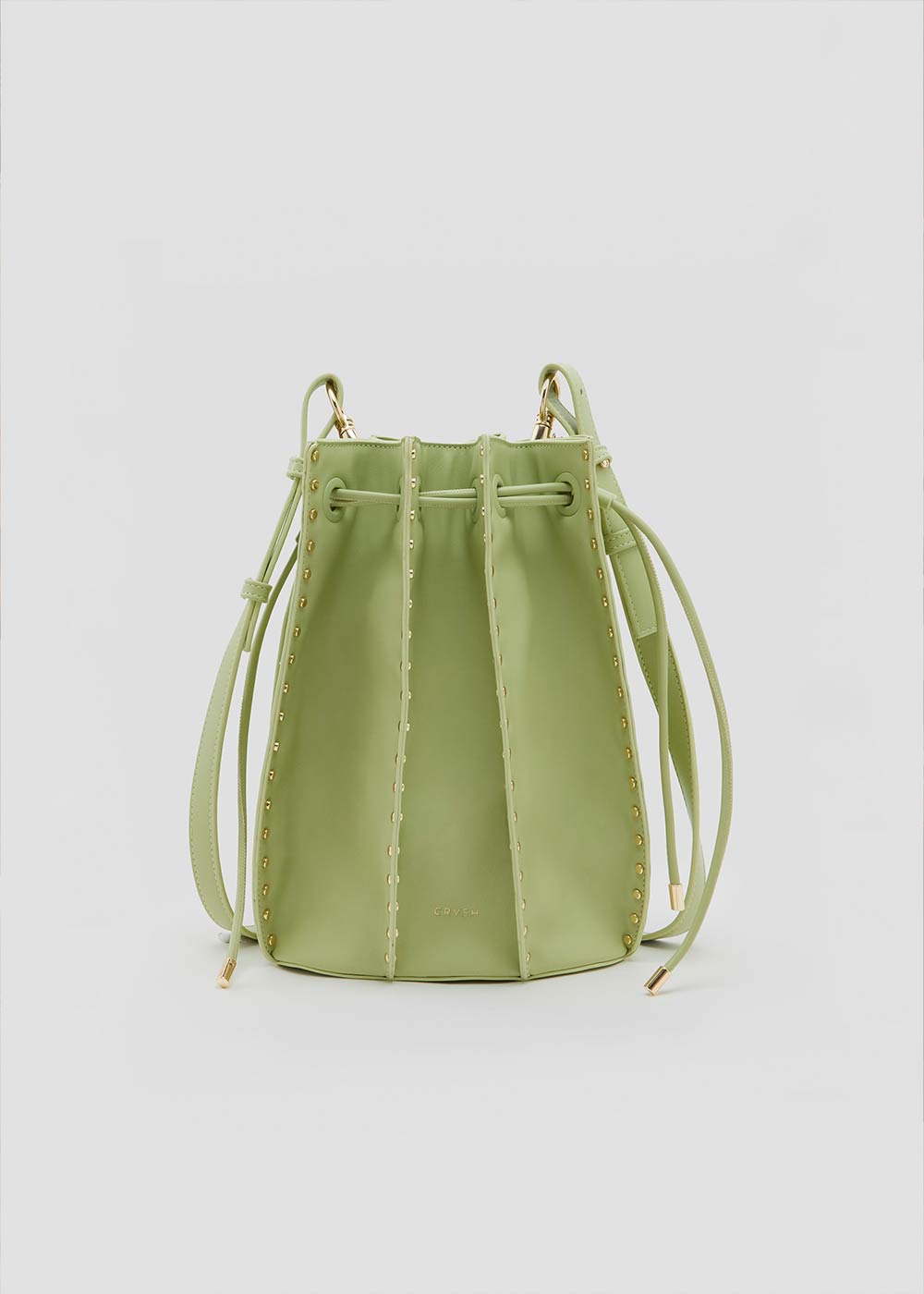 Bolso bombonera de piel vegana de máxima calidad modelo CAROLA verde. Asa regulable, tachuelas doradas. Interior con forro de CRVSH personalizado y bolsillo.